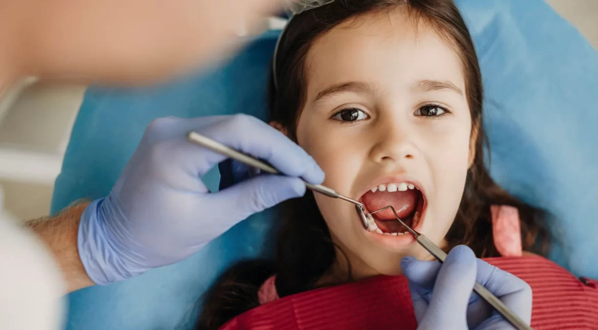 little+girl+at+pediatric+dentist+kansas+city-1920w